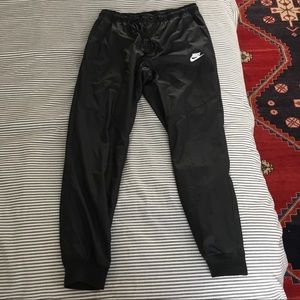 Black mesh Nike joggers